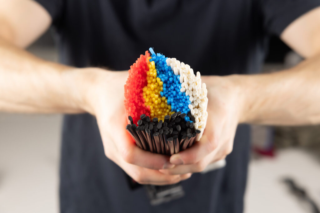 Red, yellow, blue, white and black fibres